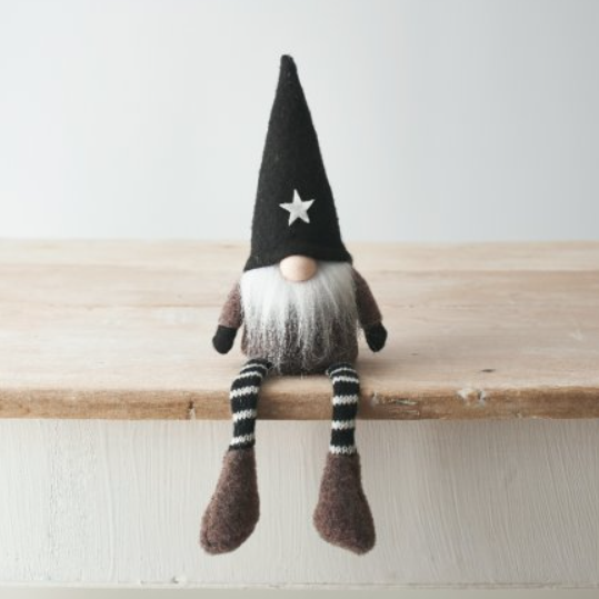 This Dangly Leg Gonk would make a wonderful edition to your shelf with its black and white strip legs, white beard and black star embellished hat