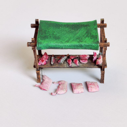 A Butcher Market Stall by Iron Gate Scenery in 28mm scale produced in PLA and resin representing a wooden stall selling meat for your town scenery, dioramas, RPGs and other tabletop games.