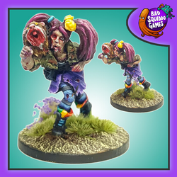 Bad Squiddo Games Zombie Annie With Zombie Peeg. A metal miniatures of zombie Annie with hair in pigtails and a zombie guinea pig on her shoulder 