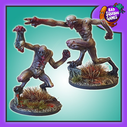 Buff Ghouls, a pack of two metal miniatures by Bad Squiddo Games sculpted by Paul Muller representing two naked creatures. One creature is holding a head and the other is pointing forward making great miniatures for your tabletop gaming, diorama and RPG needs