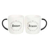 A set of two white mugs with a black handle and inside featuring a grey circle pattern with crescent moon, swirls and skull design with one mug having the word Poison and the other saying Arsenic in black writing. Sold as a set of two mugs with a 350ml capacity to add a little dark humour to your morning coffee.