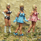 Femdroids by Crooked Dice.  A set of four metal figures (2 of each style) representing female robotic droids wearing 60s style outfits who also have machine gun boobies! They are supplied with their heads separate so you can choose which head goes on which outfit.