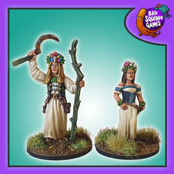 May Queens, a pack of two metal miniatures by Bad Squiddo Games sculpted by Shane Hoyle. Two ladies ready to celebrate May Day for your tabletop games, RPGs and hobby needs