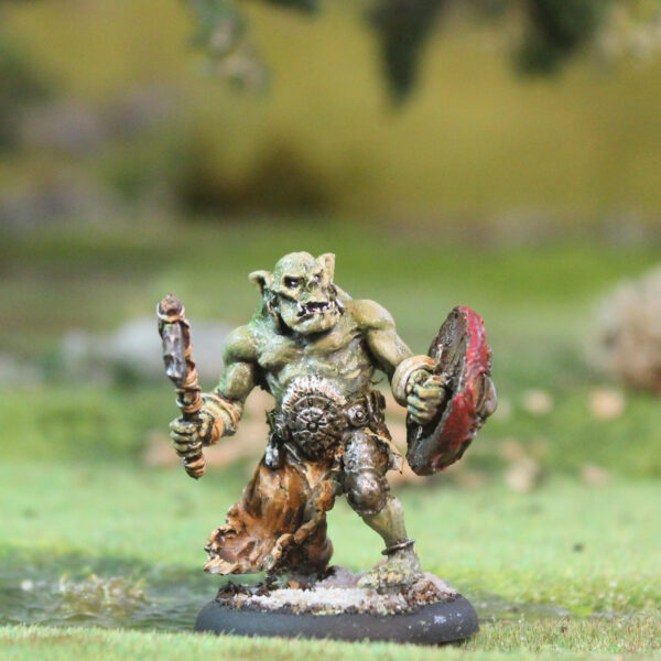 Stallu Redcap number 2 by Oakbound Studio. A multi part lead pewter miniature of a redcap warrior holding a shield and an axe