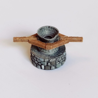 A small Millstone by Iron Gate Scenery in 28mm scale produced in PLA representing a milling stone and four grain sacks for your tabletop gaming, town scenery and RPG needs.