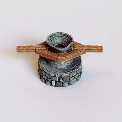 A small Millstone by Iron Gate Scenery in 28mm scale produced in PLA representing a milling stone and four grain sacks for your tabletop gaming, town scenery and RPG needs.
