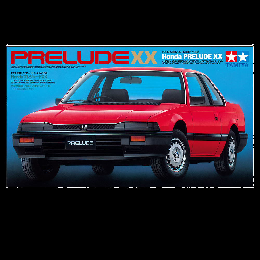 Tamiya Honda Prelude XX 1/24 Scale Model Plastic Kit. A 1/24 scale model of the Honda Prelude XX, showcasing a sleek body with retractable headlights, detailed engine, and realistic interior with bucket seats and defrosters.