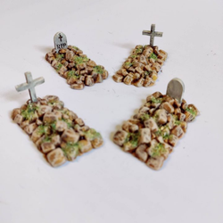 Boothill Cemetery Graves by Iron Gate Scenery printed in resin for 28mm scale. With two graves with crosses and two graves with rounded headstones helping you to add detail to your town scenery, RPGs, tabletop games, church scenery and more.