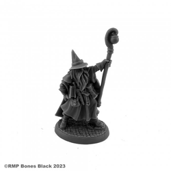 20330 Luwin Phost Wizard sculpted by Bobby Jackson from the Reaper Miniatures Bones Black range. A limited edition RPG miniature representing a male wizard holding a book under one arm and a staff in the other hand for your tabletop games