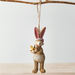 Standing Santa Rabbit With Star complete with a hanging string enabling you to add this adorable bunny wearing a red Santa hat and holding a gold star
