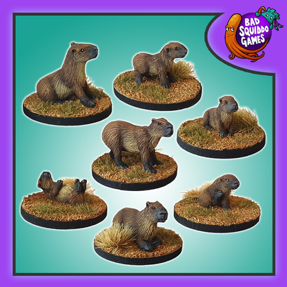 Bad Squiddo Games Capybara Family.  A pack of seven metal miniatures representing the rodent native to South America