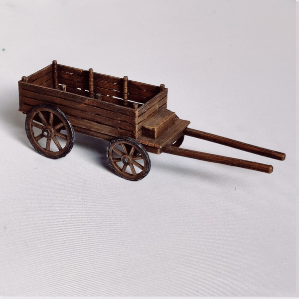 A Twin Axle Cart by Iron Gate Scenery in 28mm scale produced in PLA representing a wooden cart with four wheels adding detail and decoration to your tabletop gaming, RPGs and hobby dioramas.&nbsp;