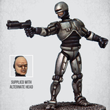 Cyborg Enforcer by Crooked Dice, one 28mm scale white metal miniature for your RPG or tabletop game representing a robotic titanium framed killing machine and comes with a choice of two heads.