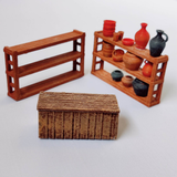 Basic Shop by Iron Gate Scenery in 28mm scale made from PLA for your tabletop gaming, RPGs, town scenery and more including one shop counter and two shelving unit.