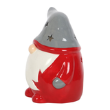 Red & Grey Gonk Tealight Holder. A wonderful Christmas Gonk / Gnome to help bring festive glow to your home, place a standard tealight inside and see the soft glow through the star shapes in the hat and back.