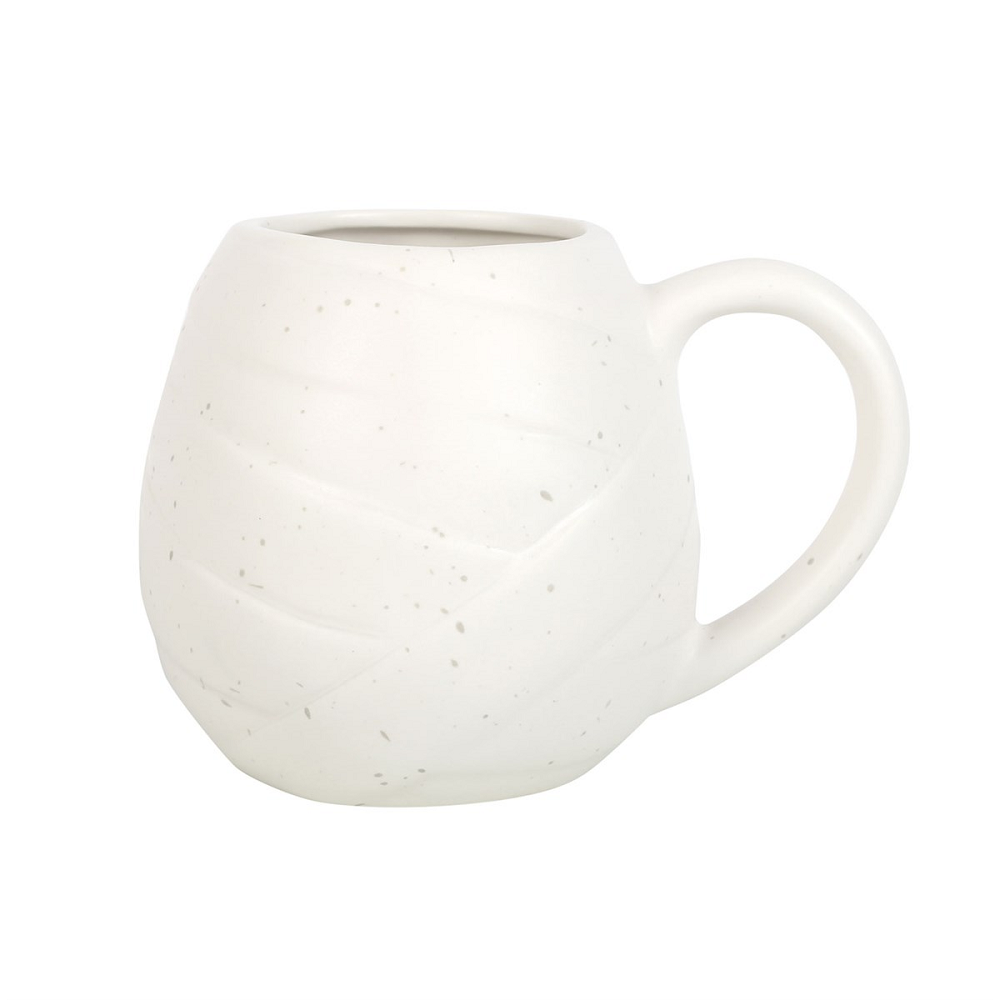 Unwrap the perfect addition to your Halloween homeware with this Mummy Shaped Rounded Mug. With its white speckled design and bandage detail, this rounded mug will keep your favourite drinks under wraps. Plus, those little black eyes add a touch of spooky fun to your kitchenware