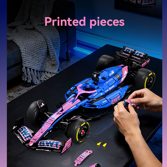 Blue and pink Formula 1 car on a...