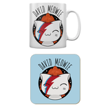 David Meowie Mug & Coaster Set by VIPets.  A white mug with a cute cat sporting the iconic Ziggy Stardust face paint making a great edition to your mug collection or as a gift for a cat lover or music fan.