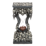 Sands Of Death Hourglass Timer. Behold the captivating décor of the Sands Of Death Hourglass Timer! This resin and glass timer combines art and functionality, filled with red sand