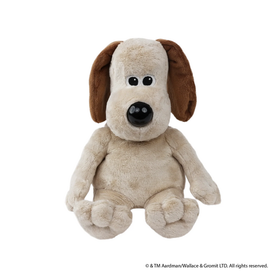 Plush toy dog with brown ears an...