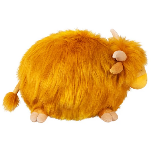 A fluffy yellow-orange plush ani...