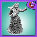 Bad Squiddo Games Eternal Bride. A metal miniatures representing an undead bride still in her wedding dress and veil holding out her hand in longing great for your RPGs, tabletop gaming and more.
