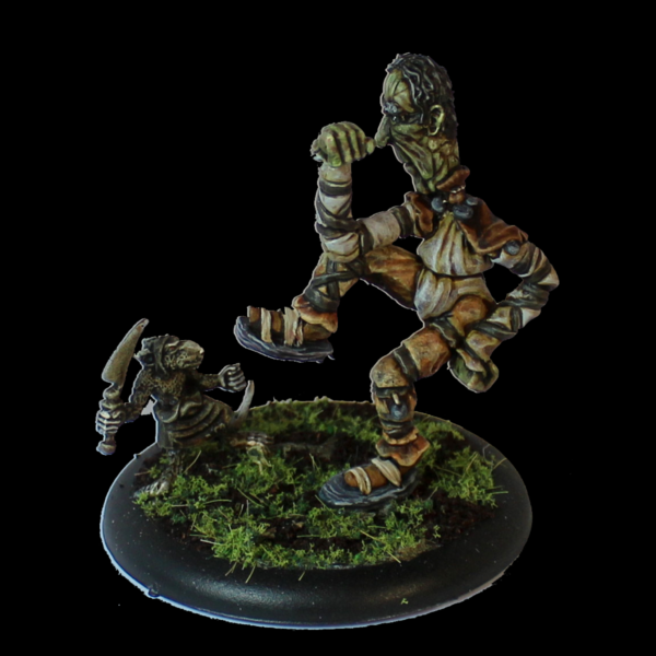 Rift-Cragg by Oakbound Studio. A lead pewter miniature representing a spriggan holding his foot in the air as if ready to stomp on something