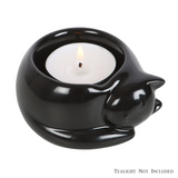 A black tealight holder representing a curled up and cosy black cat making a lovely home décor accessory, gift or ornament.