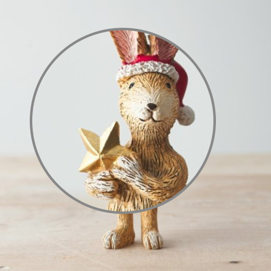 Standing Santa Rabbit With Star. An adorable bunny wearing a red Santa hat and holding a gold star 