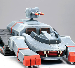 Beastmen Battletank by Crooked Dice a 3d printed futuristic transport vehicle with one turret and two cabs, two front wheel options included printed in SLA resin and multi part