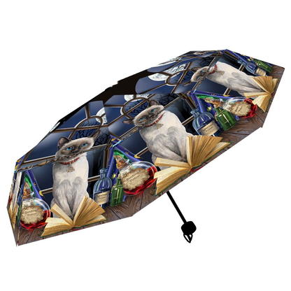 Hocus Pocus umbrella from the magical mind of Lisa Parker helping you to keep dry and be stylish with its repeat picture of a blue point Siamese cat wearing a red collar decorated with a triquetra talisman sat in front of a window with a wand in her mouth and a spell book open in front of her making a wonderful edition to your rainwear or as a gift for a cat loving friend. 