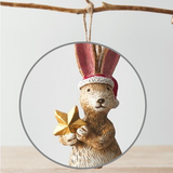 Standing Santa Rabbit With Star complete with a hanging string enabling you to add this adorable bunny wearing a red Santa hat and holding a gold star