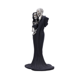 Eternal Embrace figurine by Nemesis Now - Two skeletons holding each other, the male wearing a long cape and the female in a black dress with her hand on the others head