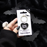 Goth Mum Keyring, a black heart with the words Goth Mum in white on a silver keyring making a wonderful edition to your keys or as a gift for a gothic mummy. 