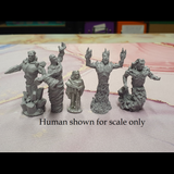 Bad Squiddo Games Elementals.  A pack of four resin miniatures representing the elements of wind, fire, earth and water with humanoid faces and arms making a great edition to your RPG 