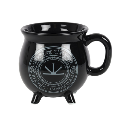 Imbolc Colour Changing Cauldron Mug By Anne Stokes. This black cauldron mug features Imbolc dragon