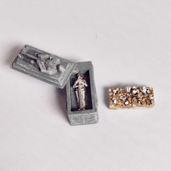 A Knights Tomb from Iron Gate Scenery printed in resin in 28mm scale, the tomb has a removable lid and comes with a skeleton and a gold stash making a great edition for your tabletop games, RPGs, dungeon scenery and other hobby needs.&nbsp; 