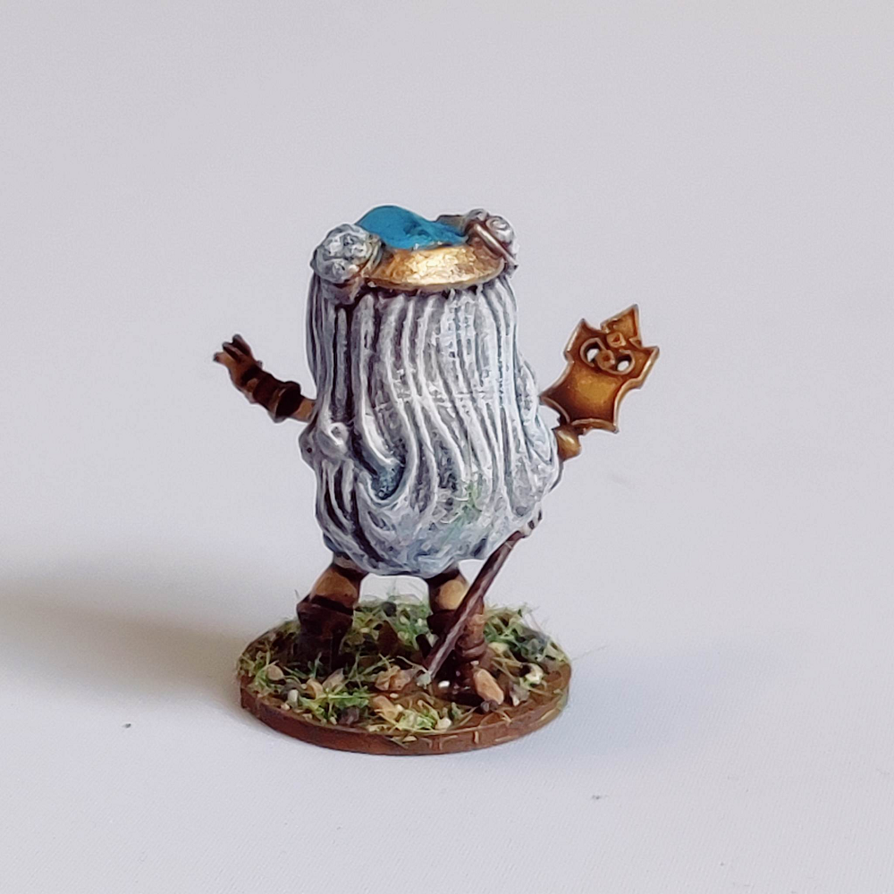 Sorceress by Iron Gate Scenery in chibi style.&nbsp; A 40mm scale printed resin miniature.&nbsp; This dress wearing, staff holding sorceress would make a wonderful edition to your RPG adventure as player characters or non player characters (NPC)