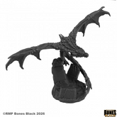 Black dragon figurine on a white...