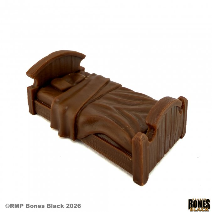 A miniature brown plastic bed frame with a wooden-textured headboard, footboard, and draped bedding, shown on a plain white background with copyright text in the corner. 44338 Green Griffin Bed - Reaper Bones Black