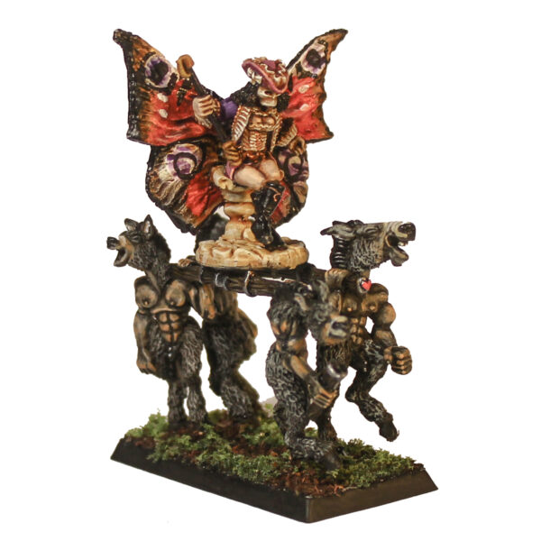 Fae Queen by Oakbound Studio. A multipart lead pewter miniature supplied with a 60mm round lipped bases. The Queen wears a skeleton mask and rides upon her throne carried by donkey like creatures with her glorious wings outstretched