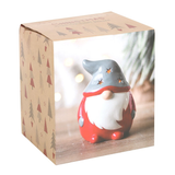 Red & Grey Gonk Tealight Holder. A wonderful Christmas Gonk / Gnome to help bring festive glow to your home, place a standard tealight inside and see the soft glow through the star shapes in the hat and back.