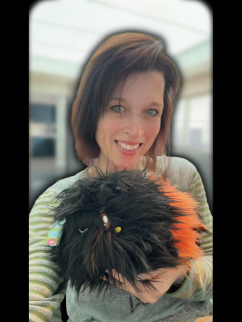 Plush toy with black and orange ...