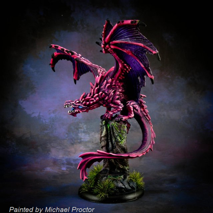 77503 Temple Dragon by Reaper Miniatures from the Reaper Bones range sculpted by Julie Guthrie. A dragon miniature with its wings up and out, perched on a rock making a great edition to your tabletop games.