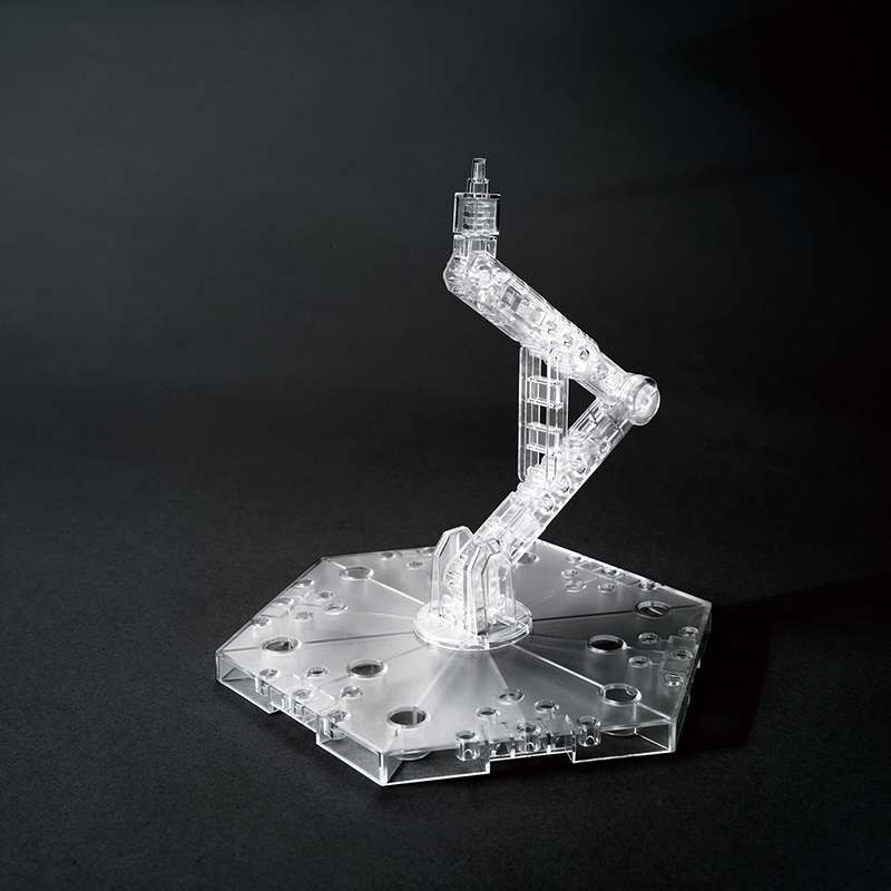 Gundam Action Base 5 Clear -Clear plastic model stand with a detailed structure on a black background