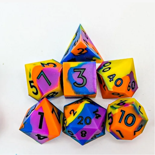 Arcane Trick-Star Silicone Dice – Mystery Dice Goblin. Set of colourful polyhedral dice on a white background
