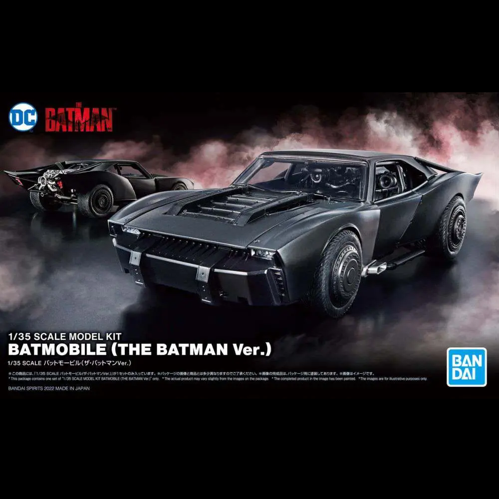 Batman Batmobile 1/35 scale model kit packaging artwork showing the assembled black car in a smoky dramatic scene, with the DC and Bandai logos visible. Batmobile The Batman Version | Bandai 1:35 Scale Model Kit