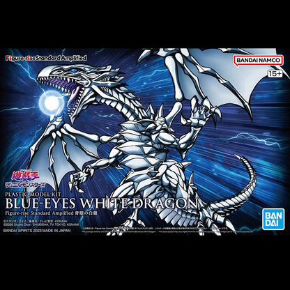 Bandai Figure-Ae Standard Amplified Blue-Eyes White Dragon plastic model kit box art, featuring a detailed illustration of the white dragon with glowing blue eyes on a dark blue background. Blue-Eyes White Dragon Yu-Gi-Oh Figure-Rise Standard Amplified Gunpla