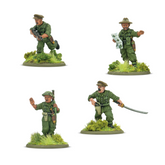 Four toy soldiers in green unifo...