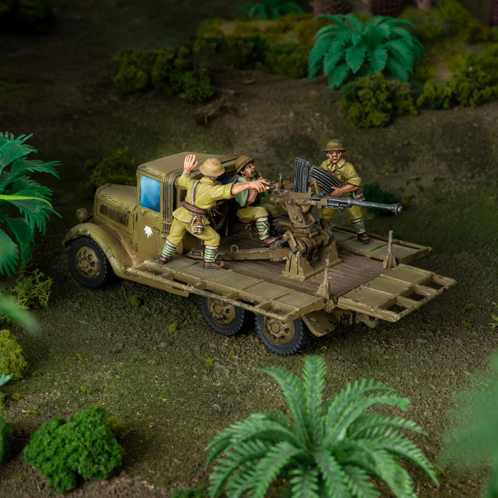 Model of a military truck with soldiers in a forest setting. Bolt Action Isuzu Type 98 AA Machine Cannon Carrier 1/56 Resin Model